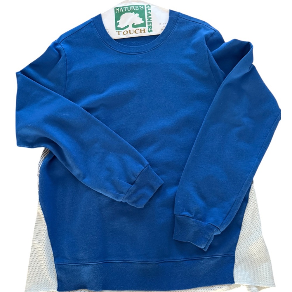 Women's Sweatshirt size large. Front is royal blue, back is stripe seersucker.